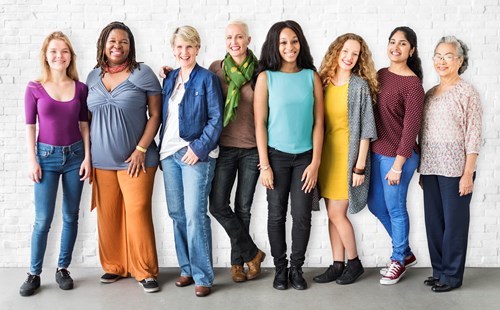 Diverse group of women standing in a row